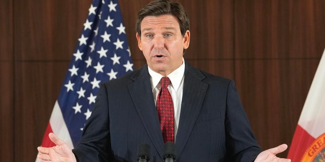 Governor Ron DeSantis gestures during a news conference where he spoke of new law enforcement legislation that will be introduced during the upcoming session, Thursday, Jan. 26, 2023, in Miami. (AP Photo/Marta Lavandier)