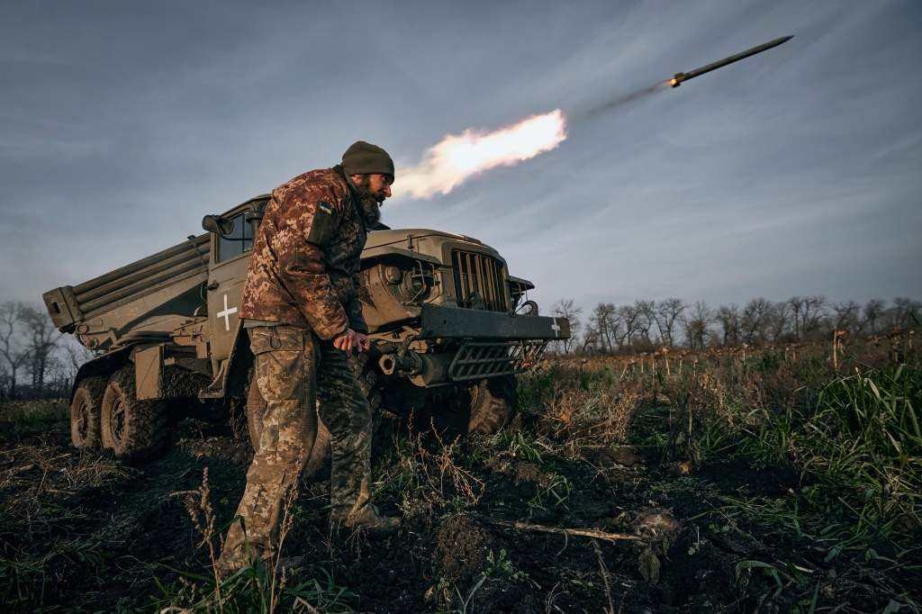 A Ukrainian soldier fires a rocket from the Grad multiple rocket launcher on Nov. 24, 2022, in the Donetsk region.