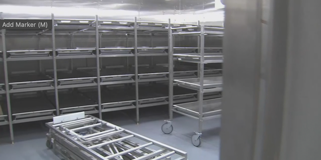 A photo of an empty morgue at a funeral home.