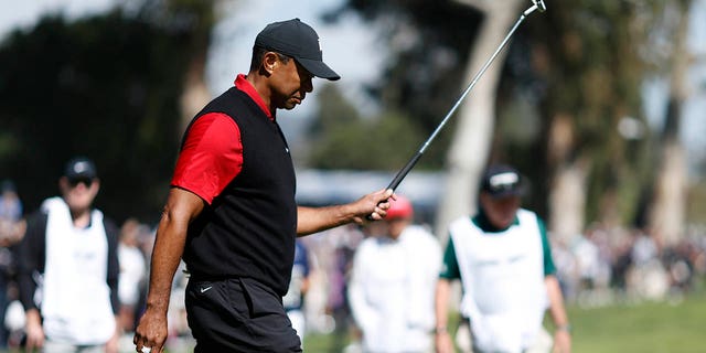 Tiger Woods of the United States reacts after a putt on the 13th green during the final round of the Genesis Invitational at Riviera Country Club on February 19, 2023, in Pacific Palisades, California.