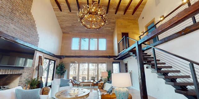 The living room in the Tobacco Barn House at Eden at Gracefield in Walterboro, South Carolina.