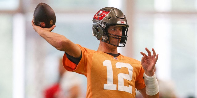 Tampa Bay Buccaneers quarterback Tom Brady (12) participates in mandatory mini camp at AdventHealth Training Center.