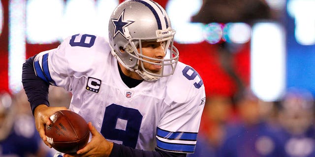 Tony Romo #9 of the Dallas Cowboys drops back against the New York Giants at MetLife Stadium on January 1, 2012, in East Rutherford, New Jersey.