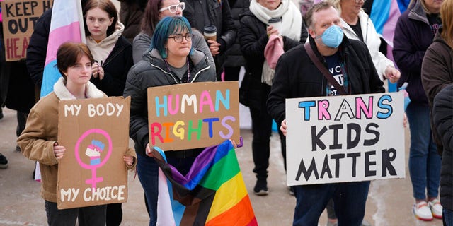 People gather in support of transgender youth during a rally at the Utah state Capitol, Jan. 24, 2023, in Salt Lake City.