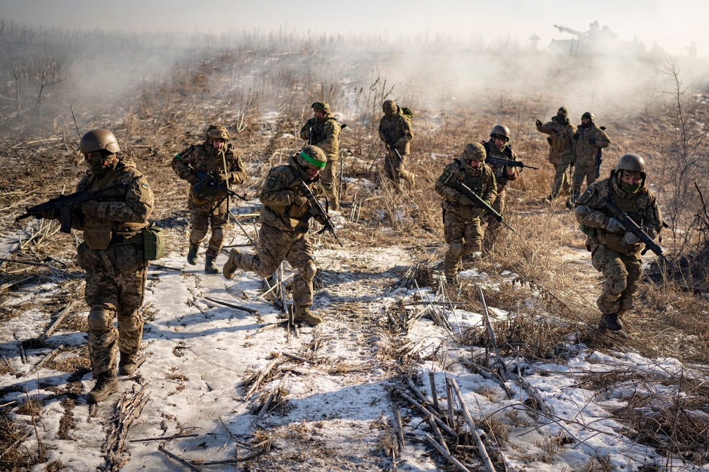 Ukrainian servicemen of the 3rd Separate Tank Iron Brigade take part in a drill, not far from the frontlines, in the Kharkiv area, Ukraine, Thursday, Feb. 23, 2023.