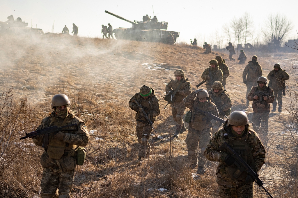 Ukrainian servicemen of the 3rd Separate Tank Iron Brigade take part in a drill, not far from the frontlines, in the Kharkiv area, Ukraine, Thursday, Feb. 23, 2023. 