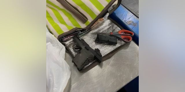 FILE - Security officers at the Fort Lauderdale Airport made the discovery recently, stating on Twitter that the gun was found wrapped inside the packaged raw chicken.