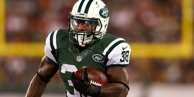 Zac Stacy #38 of the New York Jets in action against the Philadelphia Eagles during a pre-season game at MetLife Stadium on September 3, 2015 in East Rutherford, New Jersey.