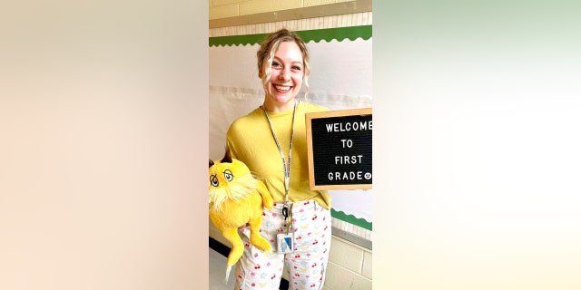 In this undated photo provided by her family and lawyers, Abigail Zwerner, a first-grade teacher at Richneck Elementary School in Newport News, Virginia, is shown inside her classroom. 