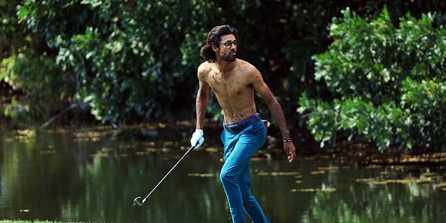 Akshay Bhatia watches after hitting his second shot on the sixth hole from the water during the third round of the Honda Classic at PGA National Resort &amp; Spa Feb. 25, 2023, in Palm Beach Gardens, Fla. 