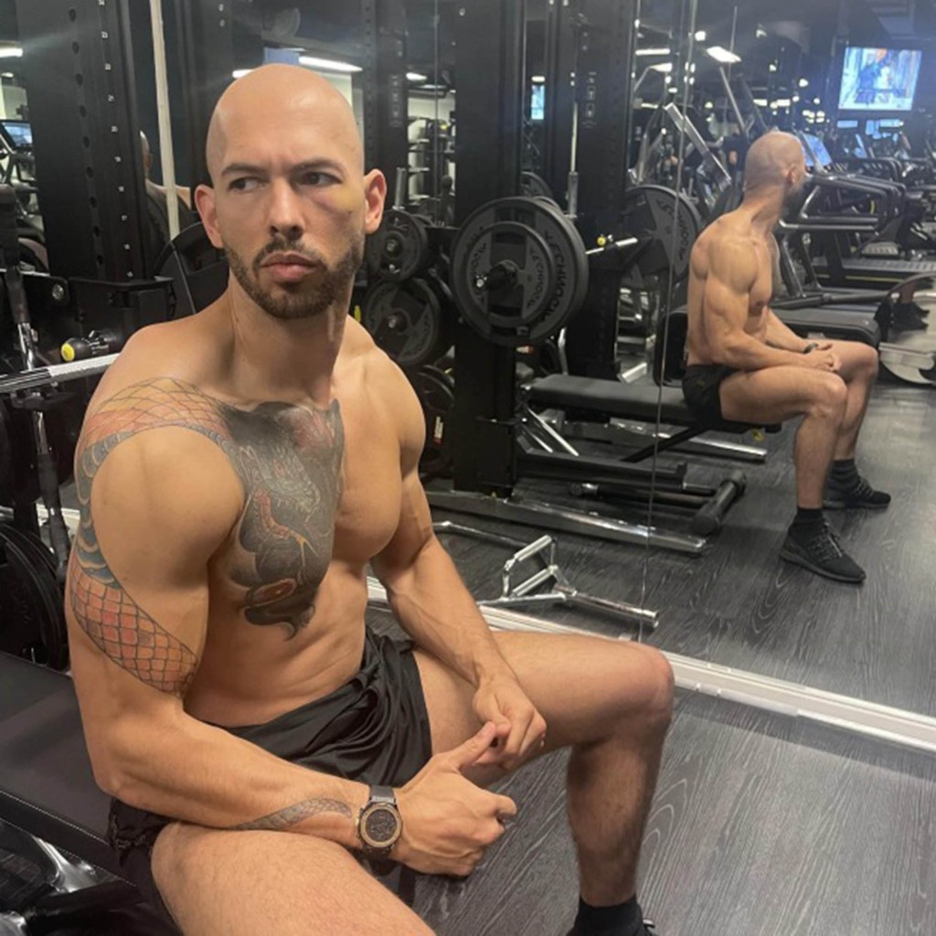 Andrew Tate poses shirtless in the gym before his arrest.