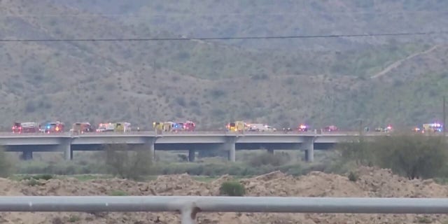 Police say two were killed and another 11 were injured when a truck crashed into a group cycling along a Goodyear, Arizona, highway. 