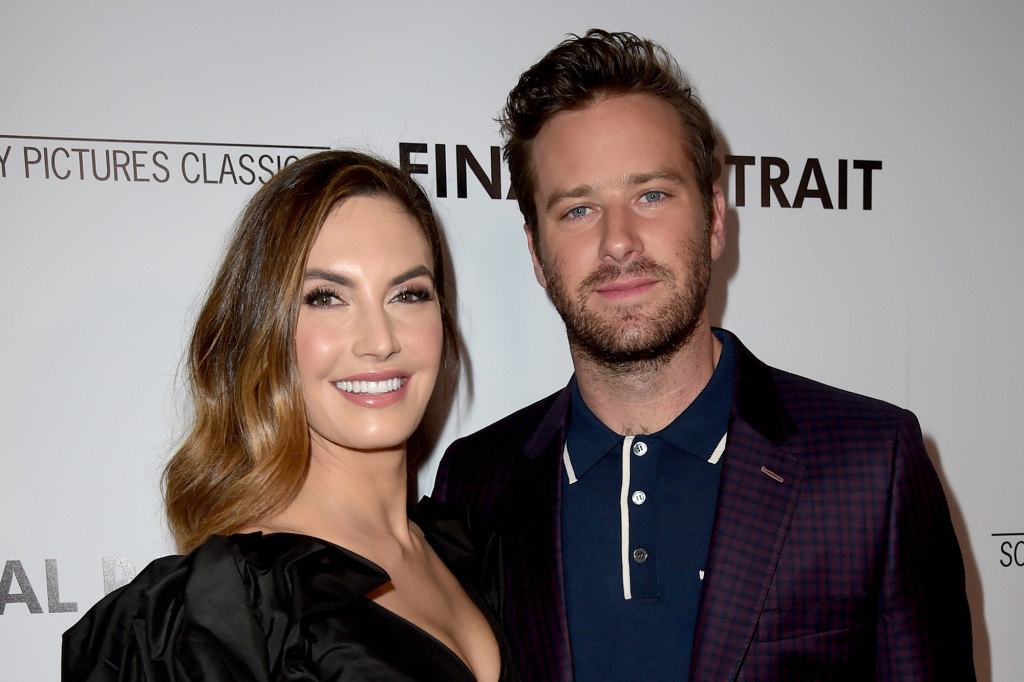 Armie Hammer and Elizabeth Chambers together at a red carpet event.