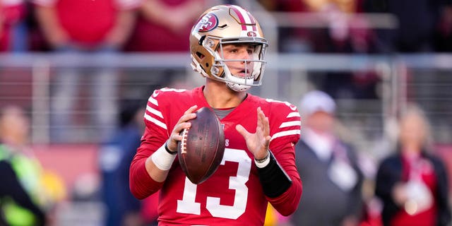 Brock Purdy of the San Francisco 49ers looks to pass against the Dallas Cowboys during the first quarter of an NFC divisional playoff game at Levi's Stadium Jan. 22, 2023, in Santa Clara, Calif.