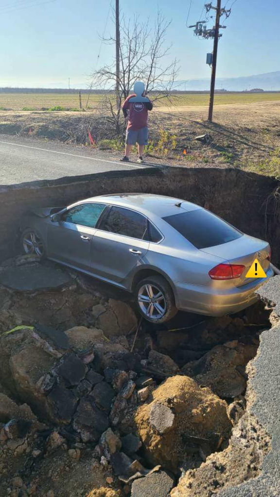 The sinkhole opened up in the road on Jan. 17 after the devastating floods that hit California. 