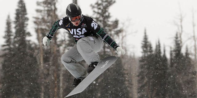 Callan Chythlook-Sifsof of the U.S. descends the course as she finished sixth during women's snowboard cross qualification at the LG Snowboard FIS World Cup Dec. 15, 2010, in Telluride, Colo. 