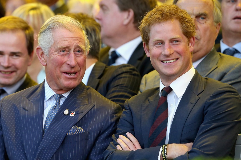 In happier times: Charles and Harry are seen sharing a laugh in 2014.