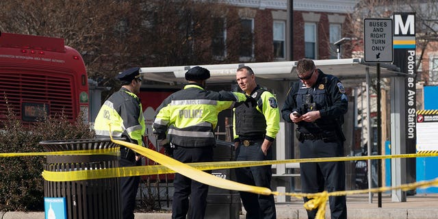 Washington Metropolitan Police officers investigate a shooting at Potomac Avenue Metro Station, in Southeast Washington, Wednesday, Feb. 1, 2023.  Isaiah Trotman, 31, is in custody for the rampage. 