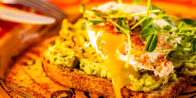 One dietitian recommends enjoying eggs as a topper for avocado toast.