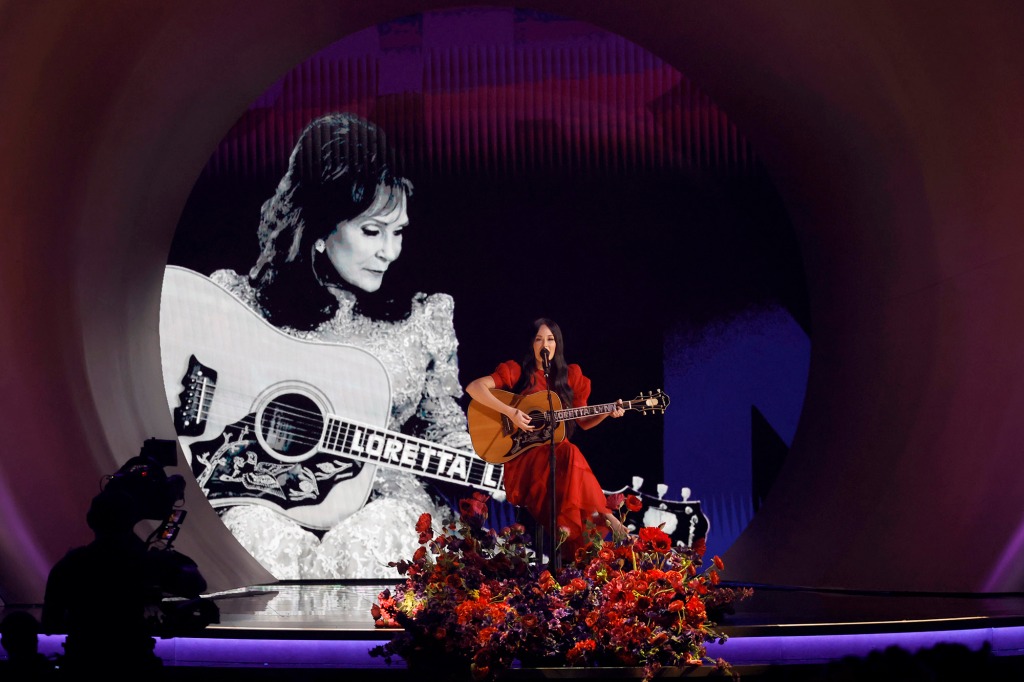 An image of the late Loretta Lynn is projected on a screen while Kacey Musgraves performs onstage during the 65th GRAMMY Awards at Crypto.com Arena on Feb. 5, 2023, in Los Angeles.
