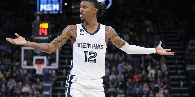 Ja Morant #12 of the Memphis Grizzlies reacts during the game against the Indiana Pacers at FedExForum on January 29, 2023 in Memphis, Tennessee. 