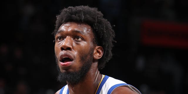 James Wiseman of the Golden State Warriors shoots a free throw during the game against the Brooklyn Nets Dec. 21, 2022, at Barclays Center in Brooklyn, N.Y. 