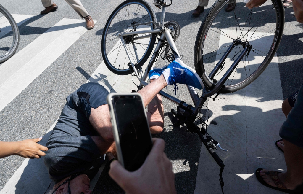 Biden falling off his bike in Rehoboth Beach, Del. in June.