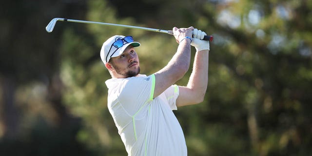 Buffalo Bills quarterback Josh Allen plays his shot from the 12th tee during the second round of the AT and T Pebble Beach Pro-Am at Spyglass Hill Golf Course Feb. 4, 2022, in Pebble Beach, Calif.