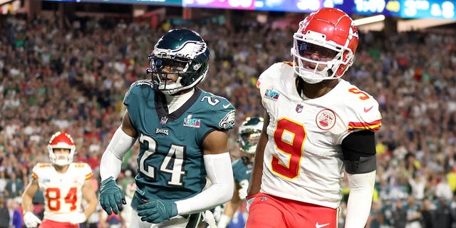 James Bradberry (24) of the Philadelphia Eagles is called for holding against JuJu Smith-Schuster (9) of the Kansas City Chiefs during the fourth quarter in Super Bowl LVII at State Farm Stadium Feb. 12, 2023 in Glendale, Ariz. 