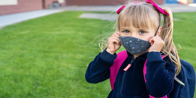 After the mandates ended, one mom's older child (not pictured) was confused and worried about not wearing a mask. 