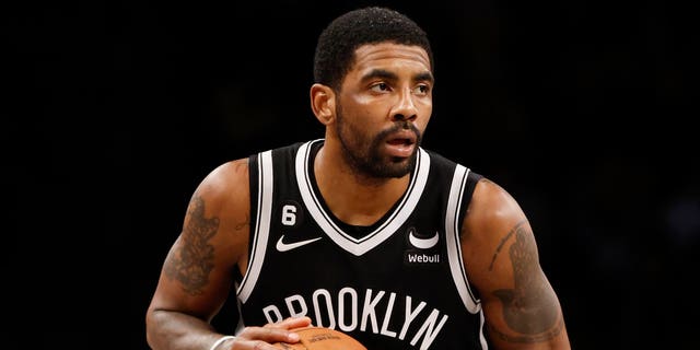 Kyrie Irving #11 of the Brooklyn Nets dribbles during the second half against the Los Angeles Lakers at Barclays Center on January 30, 2023 in the Brooklyn borough of New York City. The Nets won 121-104.