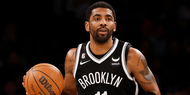 Kyrie Irving of the Brooklyn Nets dribbles against the Los Angeles Lakers at Barclays Center on Jan. 30, 2023 in New York City.