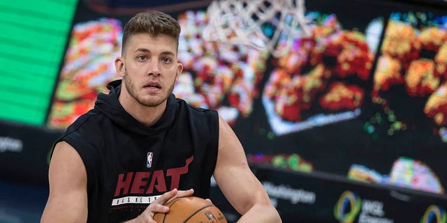 Meyers Leonard #0 of the Miami Heat warms up before the game against the Washington Wizards at Capital One Arena on January 9, 2021 in Washington, D.C. 