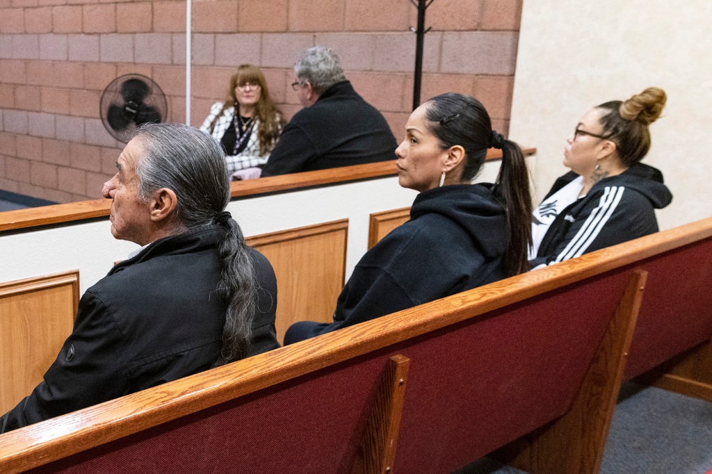 Family members of Chasing Horse sitting in the front row of court.