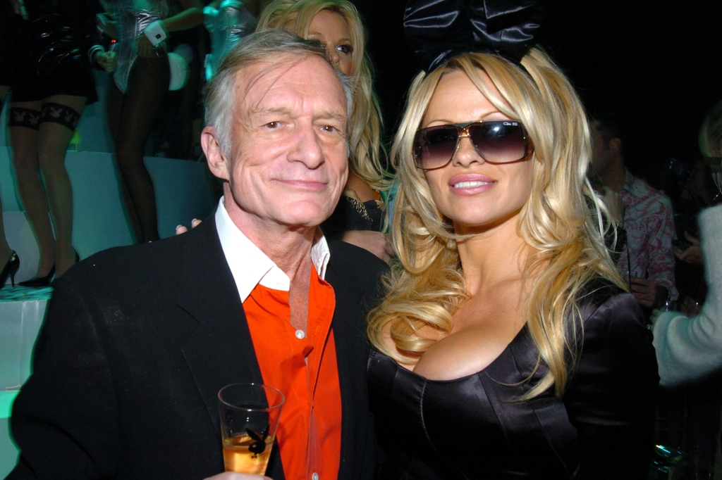 Anderson with Hugh Hefner, who helped make her a star. 