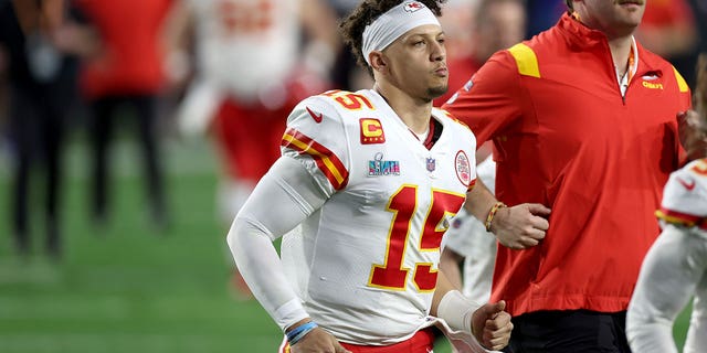 Patrick Mahomes #15 of the Kansas City Chiefs runs off the field at halftime against the Philadelphia Eagles in Super Bowl LVII at State Farm Stadium on February 12, 2023, in Glendale, Arizona. 