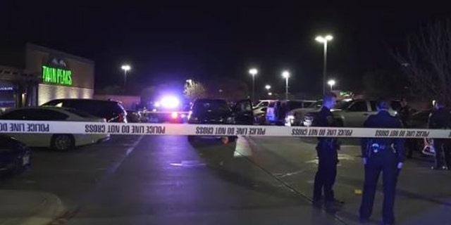 Crime scene tape blocks off a Twin Peaks in San Antonio as police investigate a tasing and shooting. 