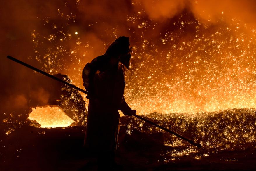 A steel worker at a blast furnace of the Zaporizhstal steel plant.