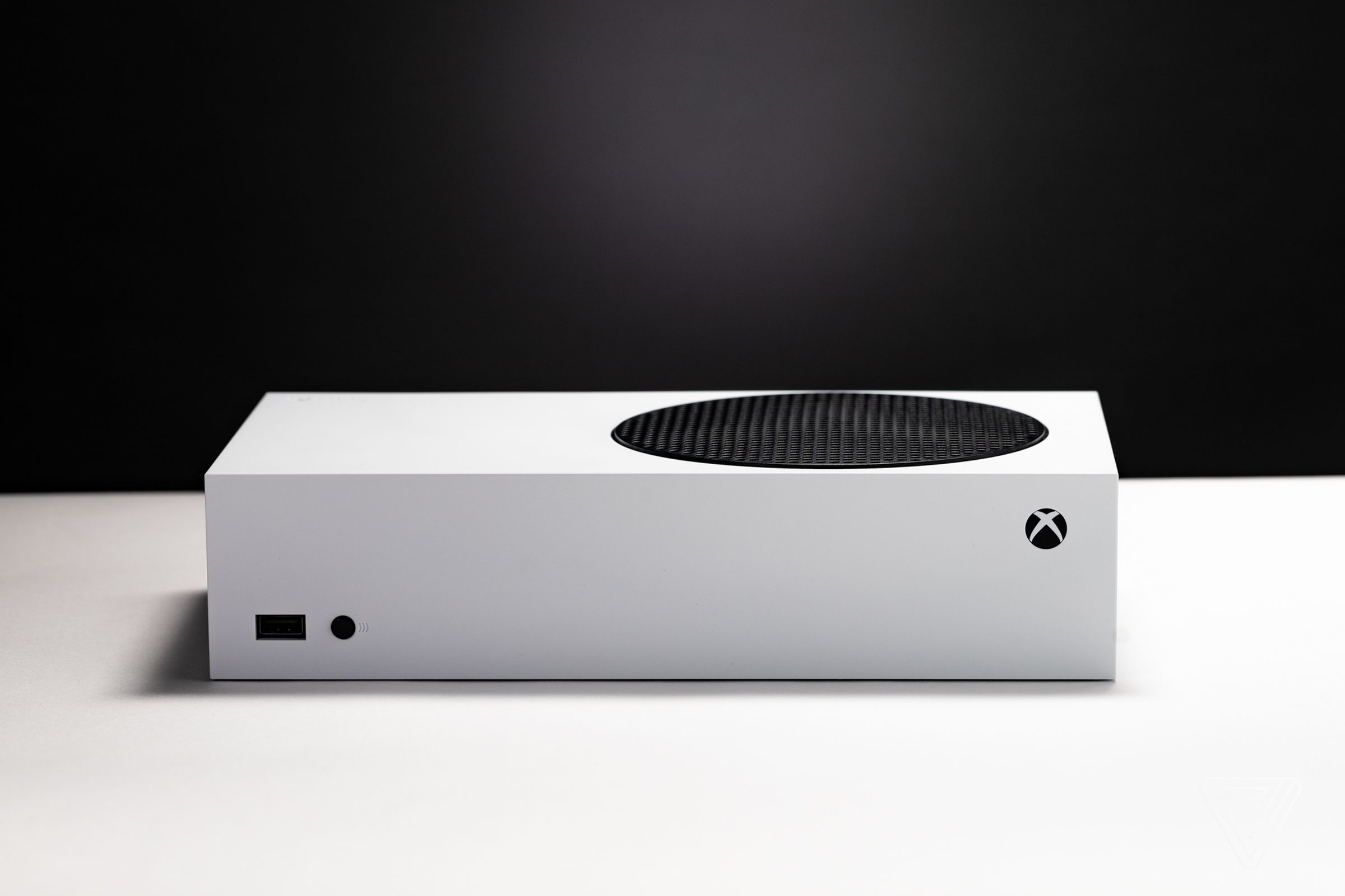 The white Xbox Series S lying horizontally.