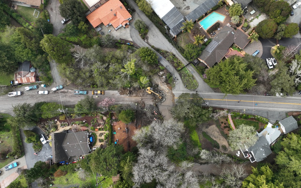 An aerial view of a washed-out road in Soquel, California on March 10, 2023.