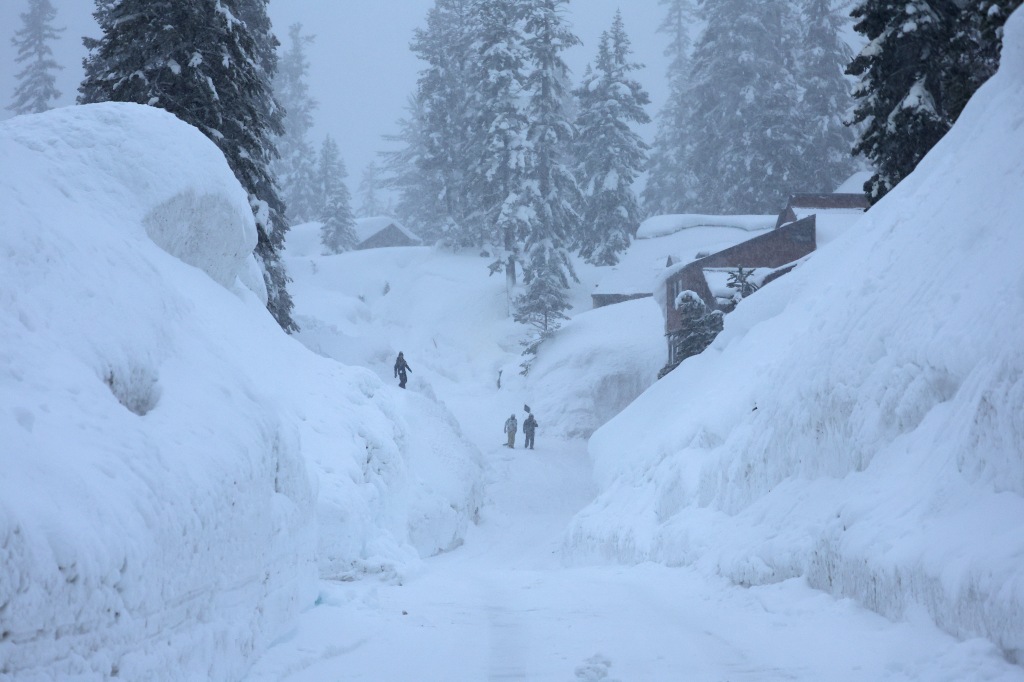 A street in Mammoth Lakes, California is lined by snowbanks after more than eight feet of snow dropped onto the area.