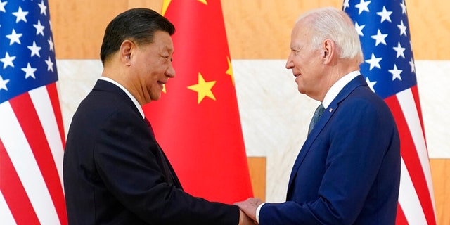 President Joe Biden, right, and Chinese President Xi Jinping shake hands before their meeting on the sidelines of the G20 summit meeting, Monday, Nov. 14, 2022, in Nusa Dua, in Bali, Indonesia. 