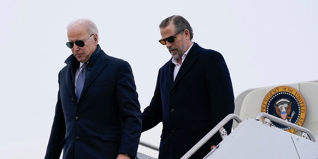 President Biden and his son, Hunter Biden, step off Air Force One, Saturday, Feb. 4, 2023, at Hancock Field Air National Guard Base in Syracuse, New York.