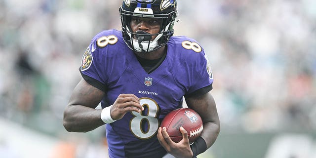 Lamar Jackson of the Baltimore Ravens runs against the New York Jets at MetLife Stadium on Sept. 11, 2022, in East Rutherford, New Jersey.