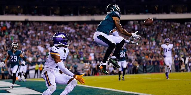 Eagles cornerback Darius Slay intercepts a pass intended for Minnesota Vikings wide receiver Justin Jefferson, Sept. 19, 2022, in Philadelphia.