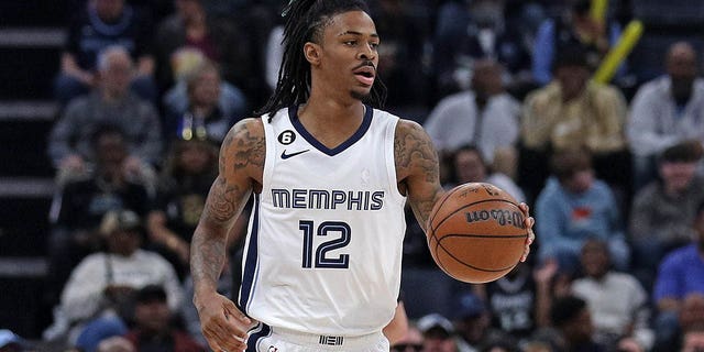 Ja Morant of the Memphis Grizzlies dribbles during the game against the New Orleans Pelicans at FedExForum in Memphis, Tennessee, on Dec. 31, 2022.