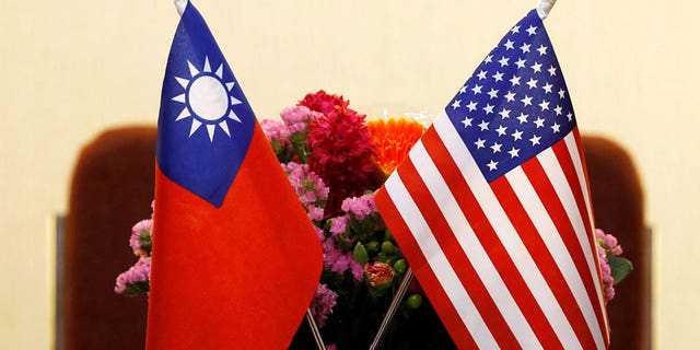 Flags of Taiwan and the U.S. are placed for a meeting in Taipei, Taiwan, March 27, 2018. 