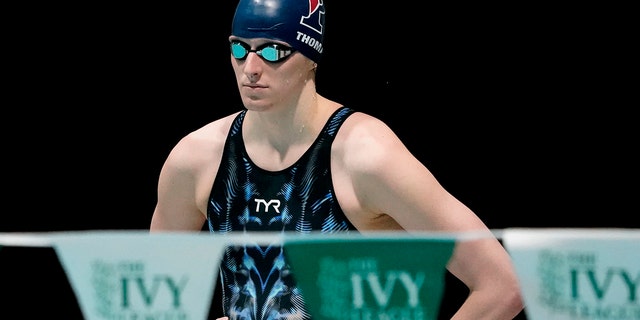 Penn's Lia Thomas waits to swim in a qualifying heat at the Ivy League Women's Swimming and Diving Championships at Harvard University, Feb. 18, 2022.