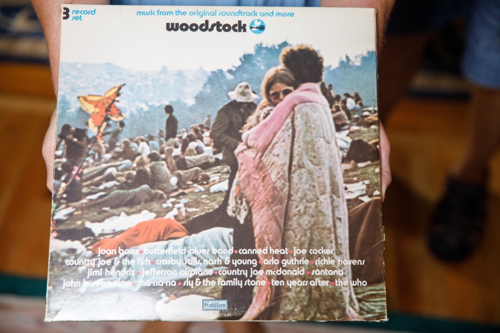 The iconic Woodstock album with Bobbi and Nick Ercoline is shown.