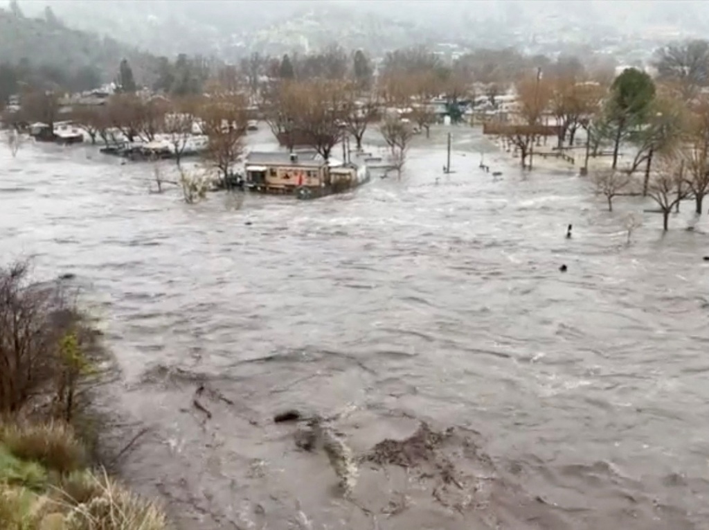 The overflowed Kern River is shown in this screengrab from a video obtained from social media, in Kernville, California, U.S., March 10, 2023